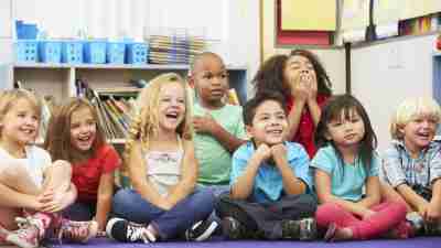 Group of Elementary Pupils In Classroom