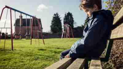 Lonely boy in the park