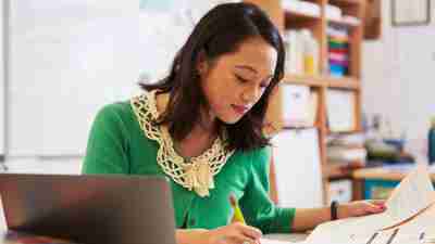 Teacher focused on doing work